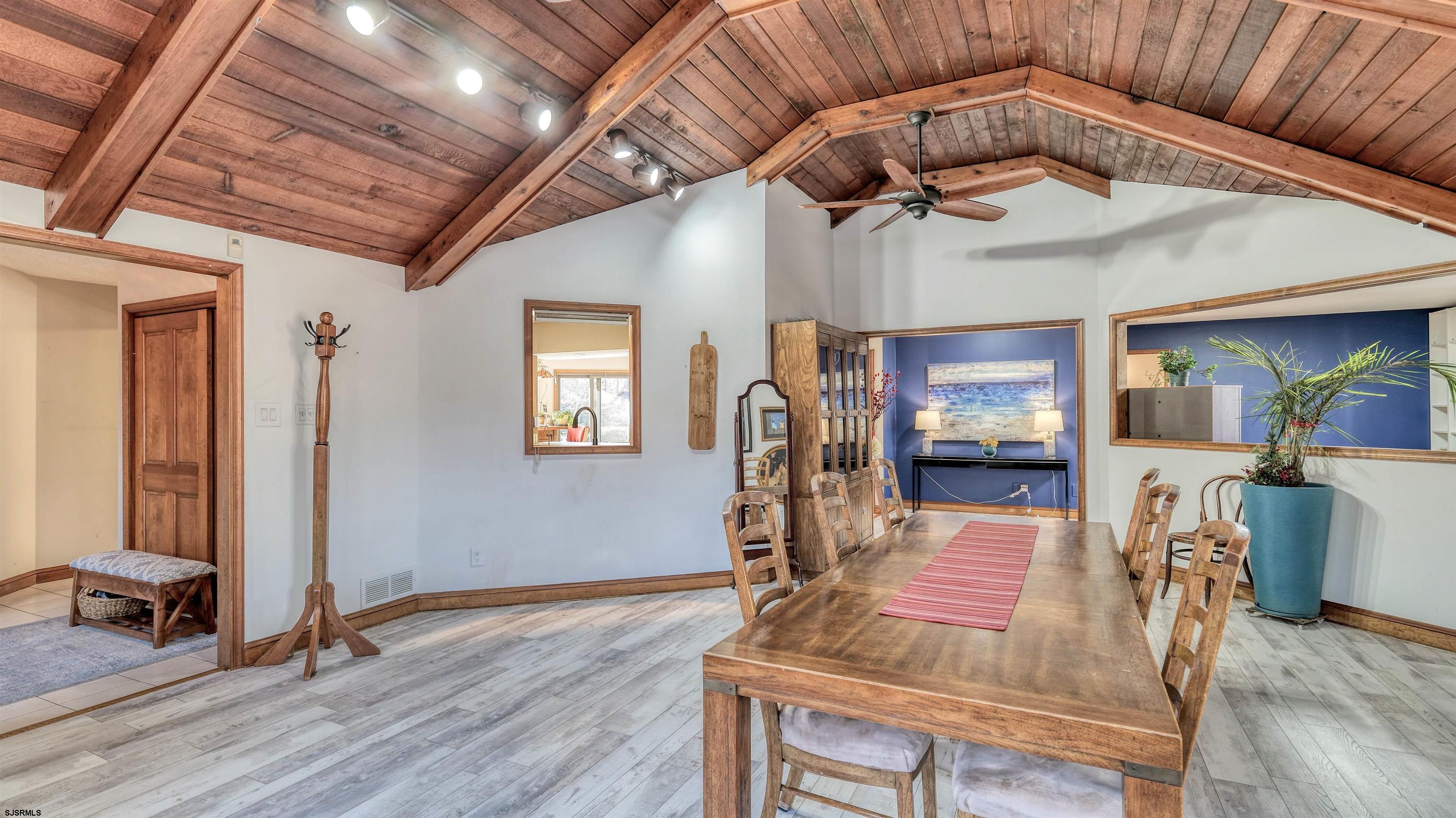 3 School House Road Egg Harbor Township, NJ 08234 - Photo 4 of 56 a view of a livingroom with furniture and a ceiling fan