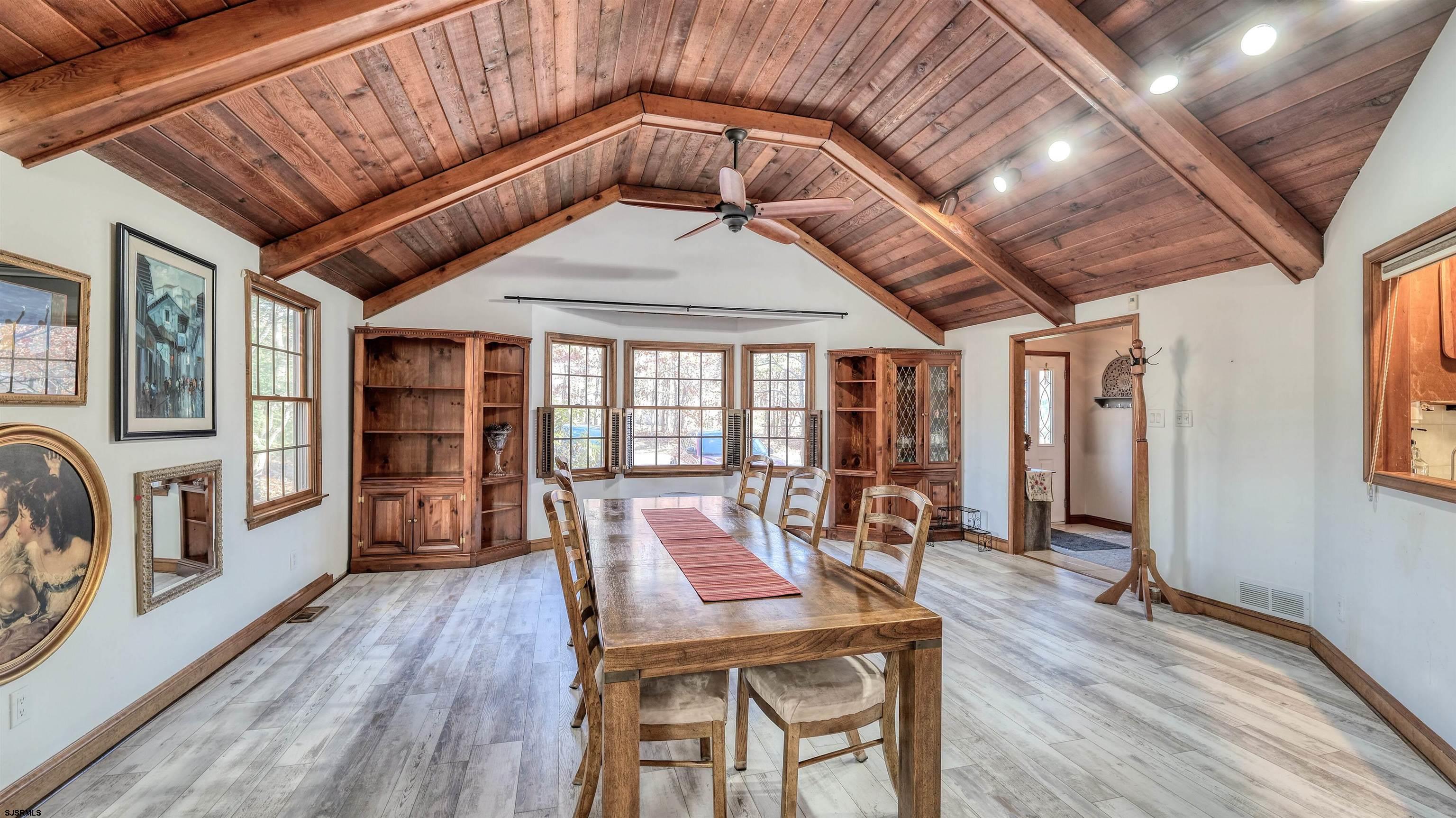 3 School House Road Egg Harbor Township, NJ 08234 - Photo 4 of 56 a dining room with furniture water view and wooden floor