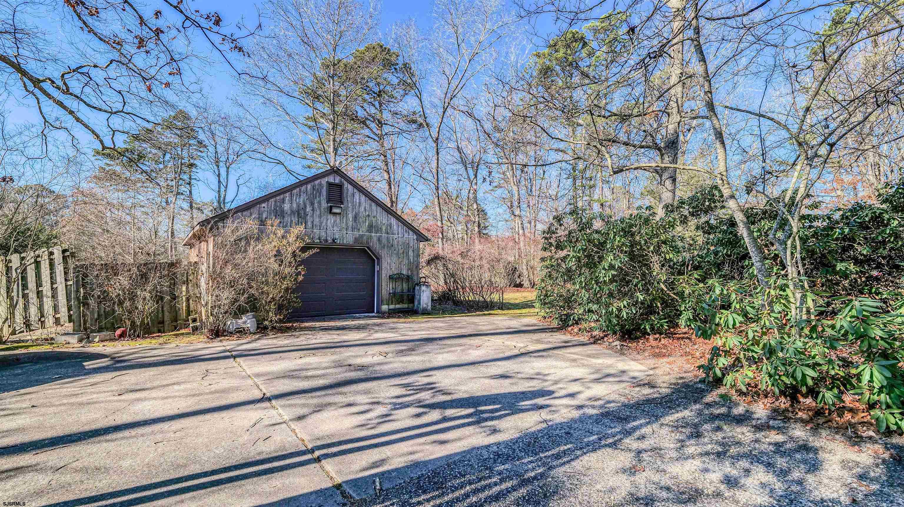 3 School House Road Egg Harbor Township, NJ 08234 - Photo 41 of 56 a view of a house with a yard