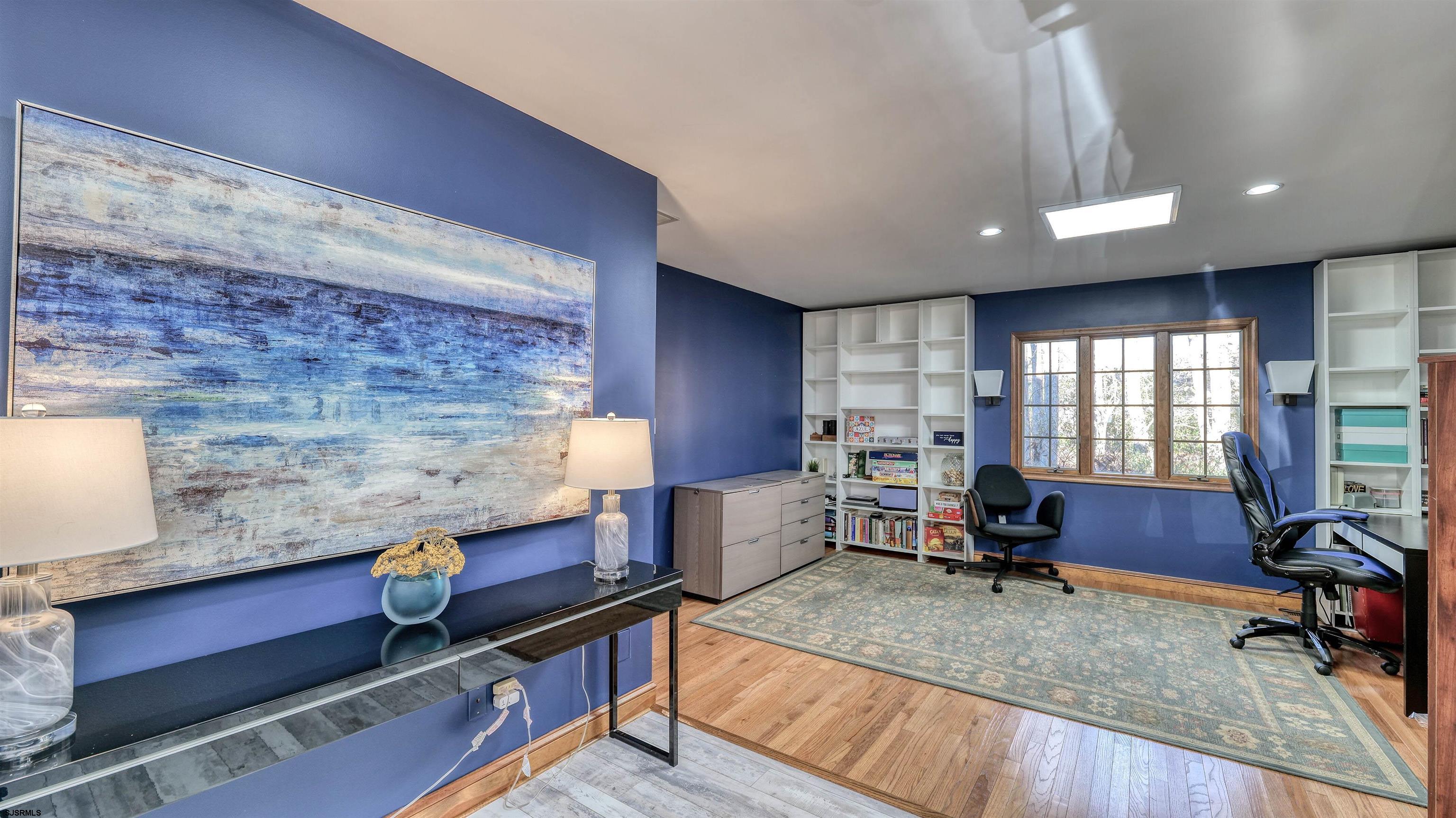 3 School House Road Egg Harbor Township, NJ 08234 - Photo 5 of 56 a living room with furniture and a wooden floor