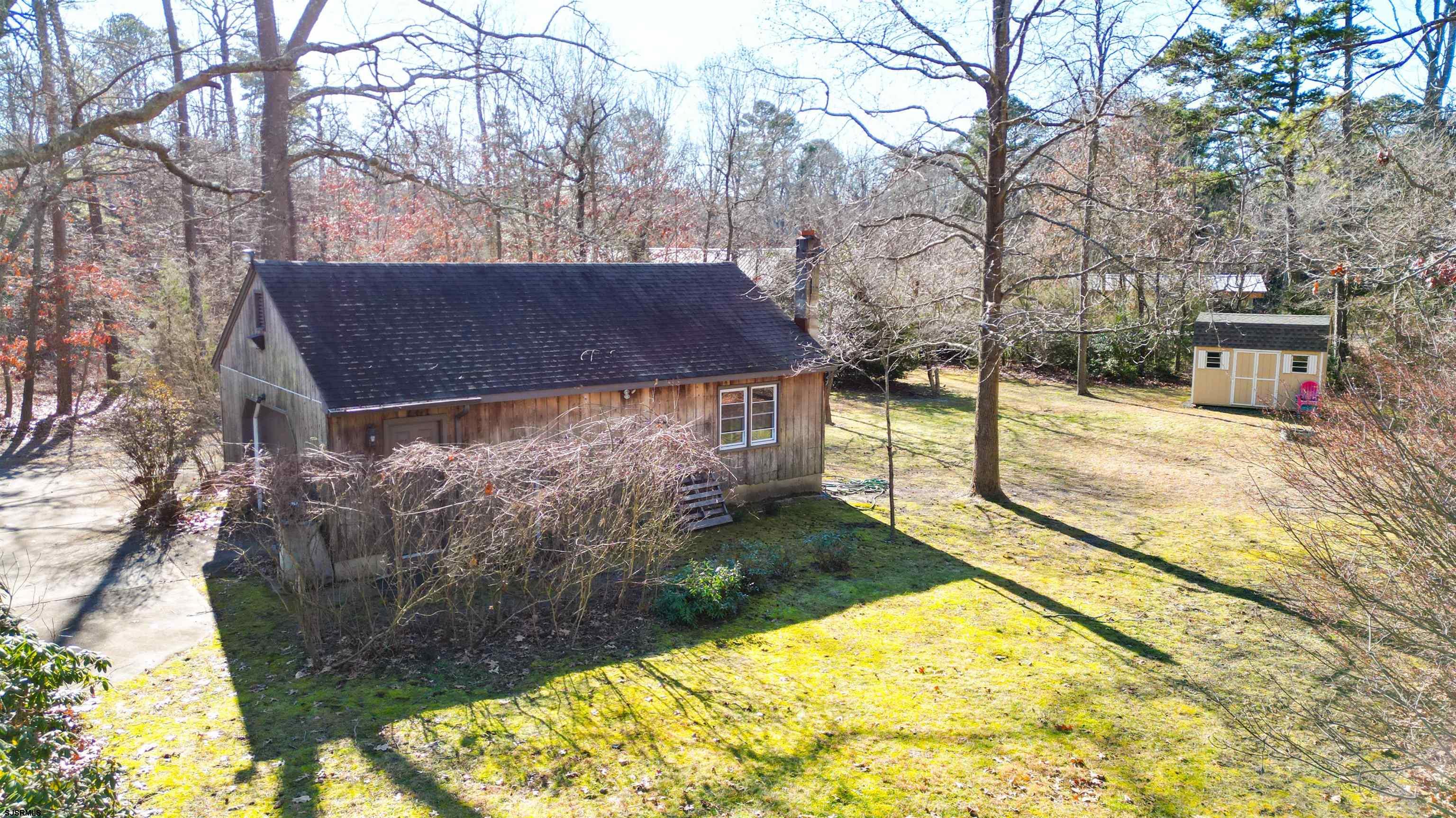 3 School House Road Egg Harbor Township, NJ 08234 - Photo 52 of 56 a view of back yard of the house