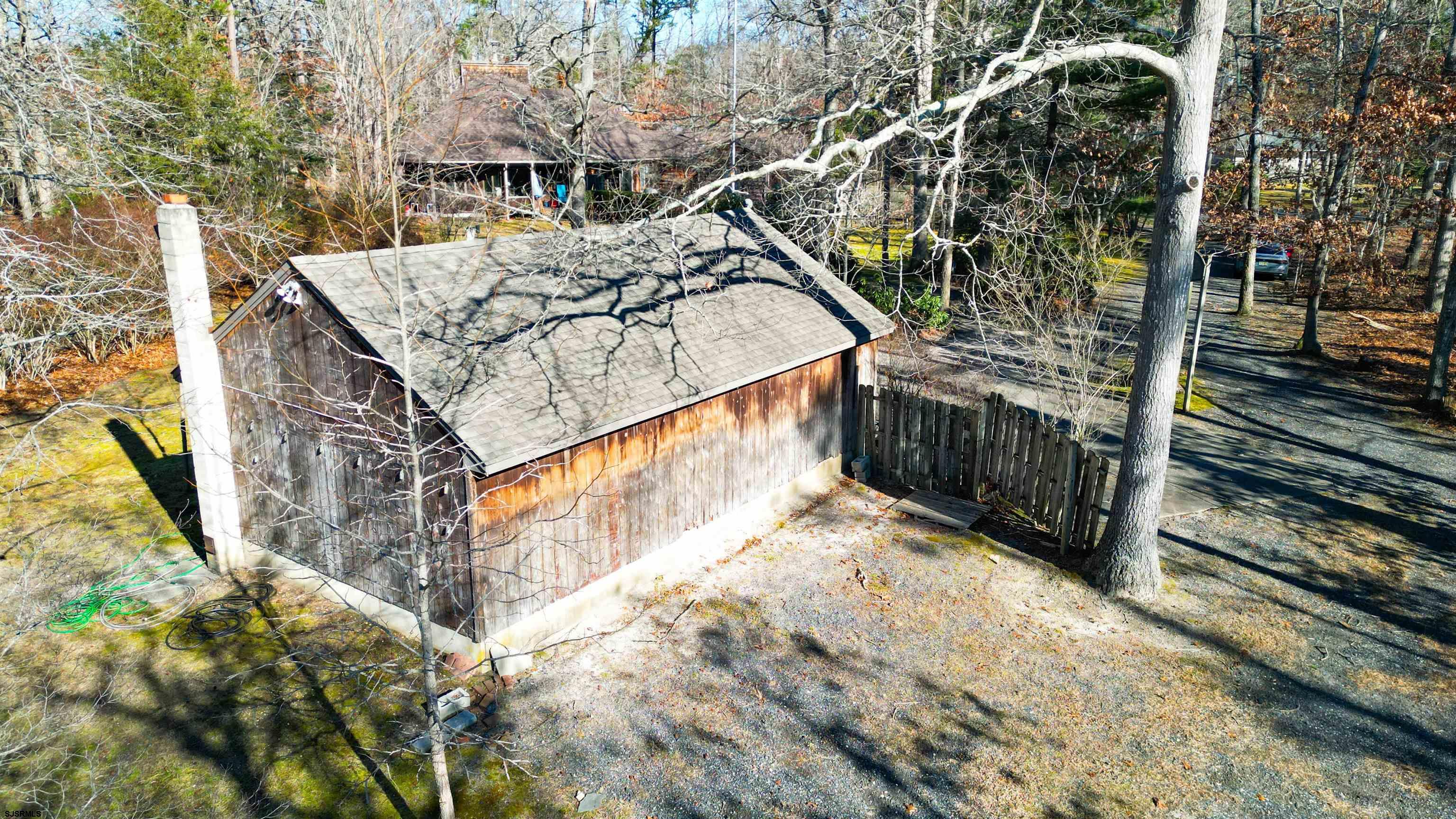 3 School House Road Egg Harbor Township, NJ 08234 - Photo 53 of 56 a view of balcony with wooden floor and fence