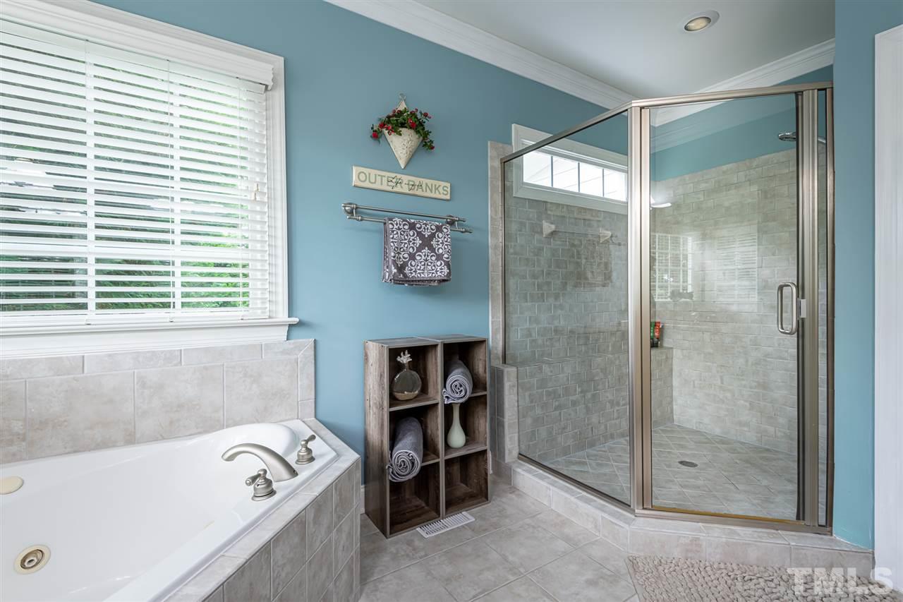 2916 SnapsWell Street Raleigh, NC 27614 - Photo 15 of 30 Large Tiled Shower with Window Transom.
