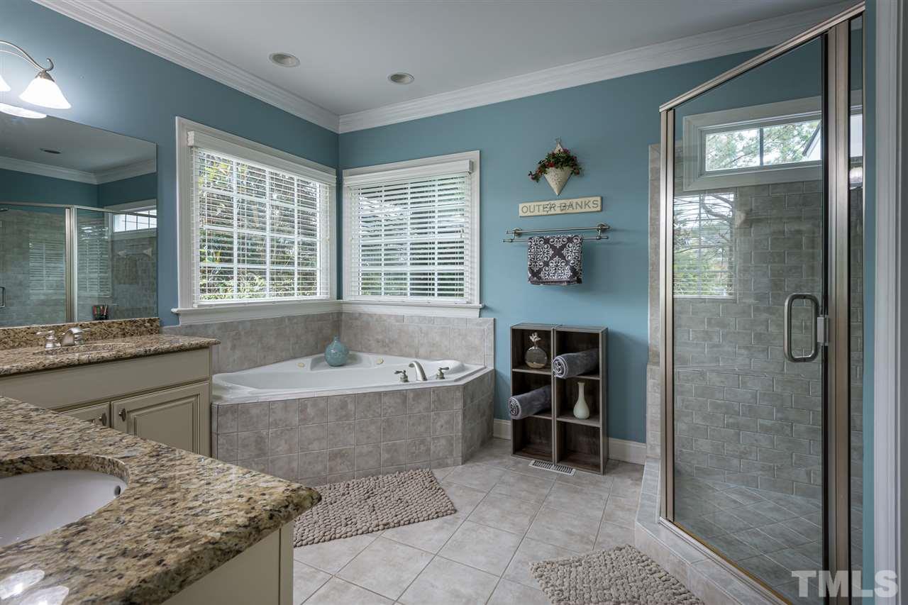 2916 SnapsWell Street Raleigh, NC 27614 - Photo 16 of 30 Spacious and Smart Owner's Spa Bath with Soaking Tub and Separate Large Shower.