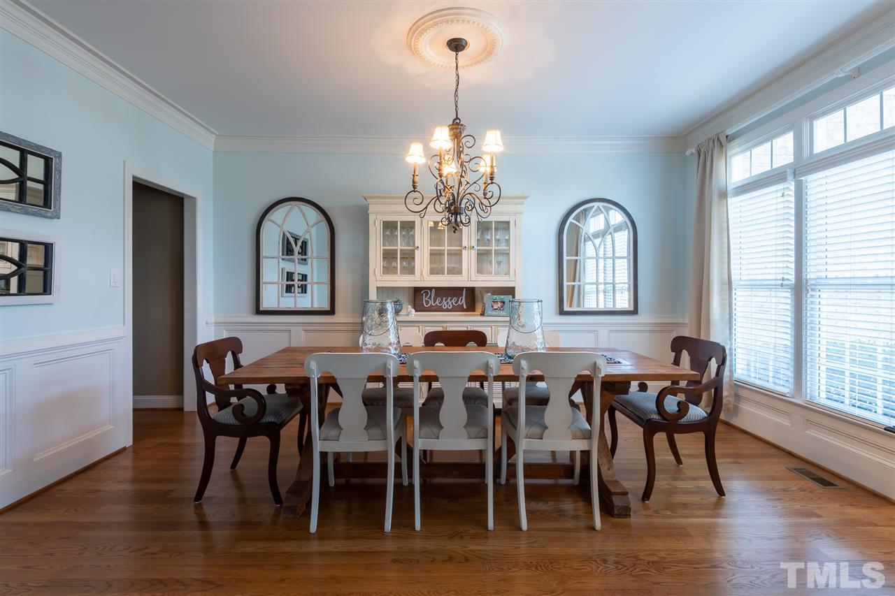 2916 SnapsWell Street Raleigh, NC 27614 - Photo 5 of 30 This Over sized 16' Plus Dining Room Accommodates that Large Table for Ultimate Room to Enjoy Plenty of Family & Guests for Those Special Occasions. Pull up a Chair and Gather for Laughs and Good Food ! Beautiful Dual Front Windows with Transoms.