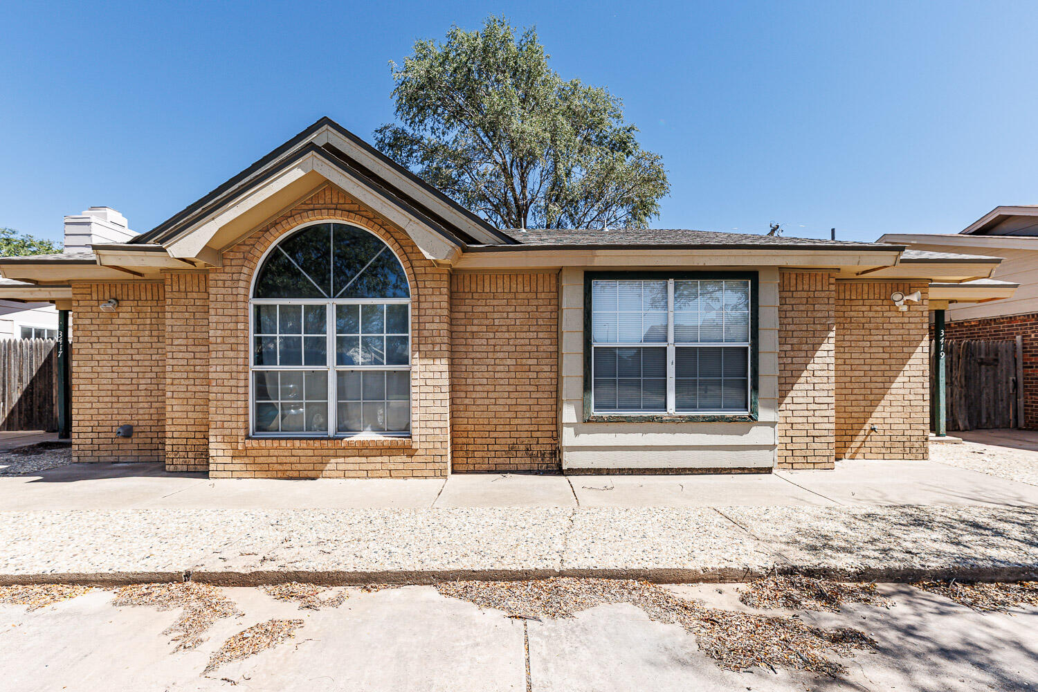 Package Property Package Property 6th Street Lubbock, TX 79416 - Photo 11 of 14 a front view of a house