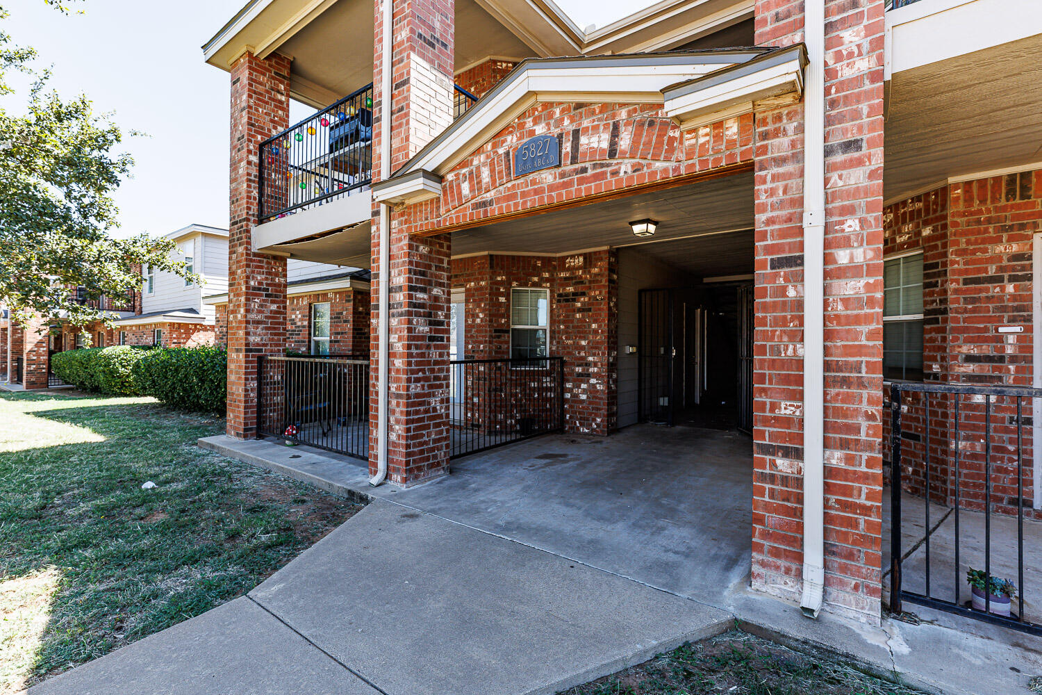 Package Property Package Property 6th Street Lubbock, TX 79416 - Photo 3 of 14 front view of a building with a yard