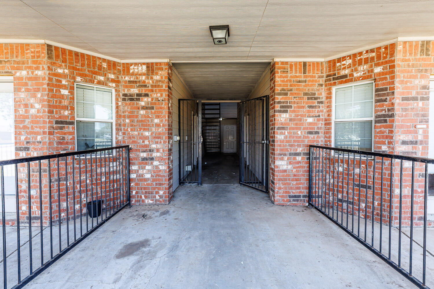 Package Property Package Property 6th Street Lubbock, TX 79416 - Photo 4 of 14 a view of entryway with a brick wall