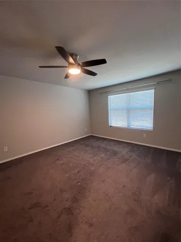 a bathroom with a double vanity sink and mirror