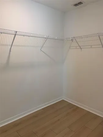 a view of a room with racks on the wall