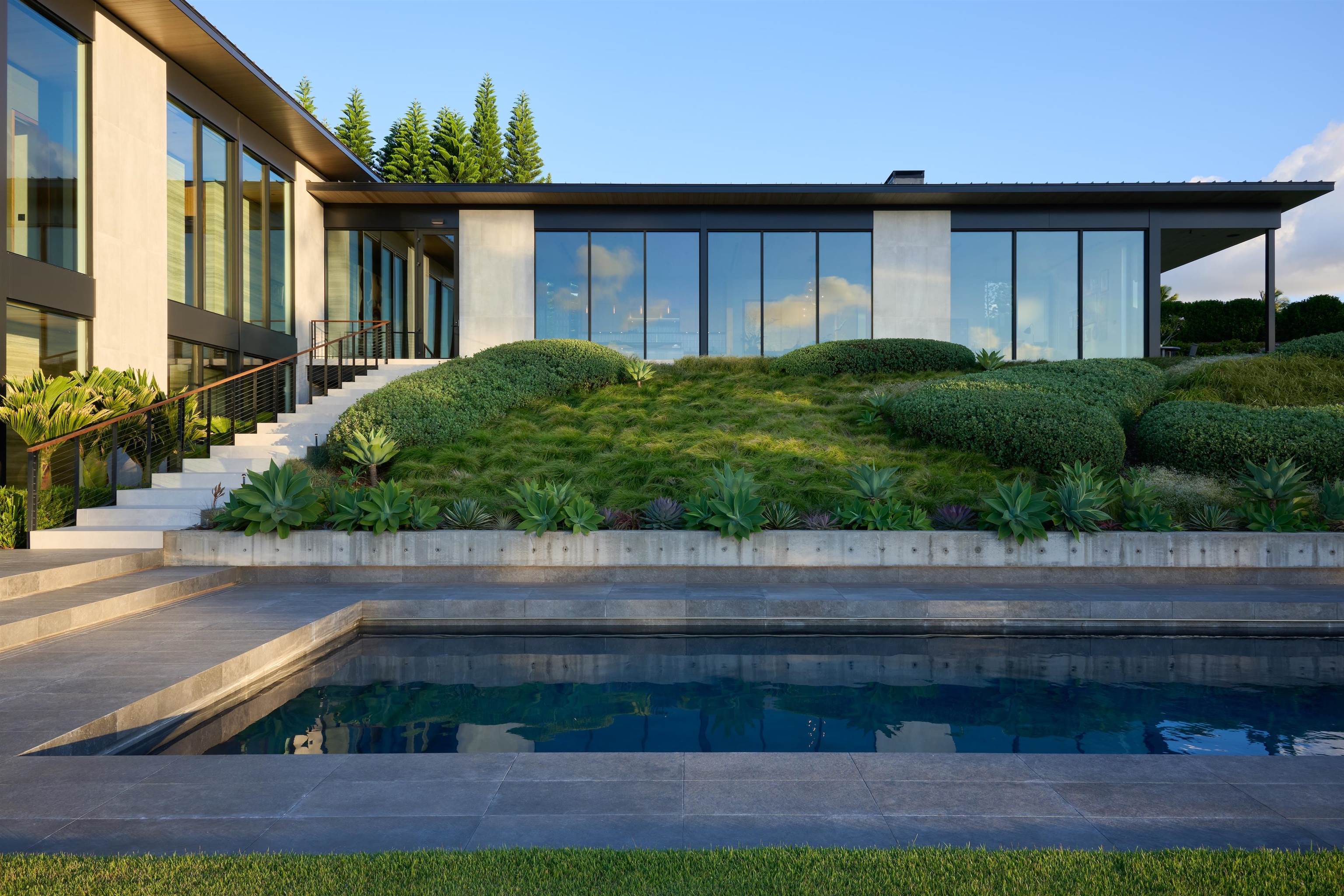 1642 West Kuiaha Road Haiku, HI 96708 - Photo 3 of 50 a front view of a house with a yard