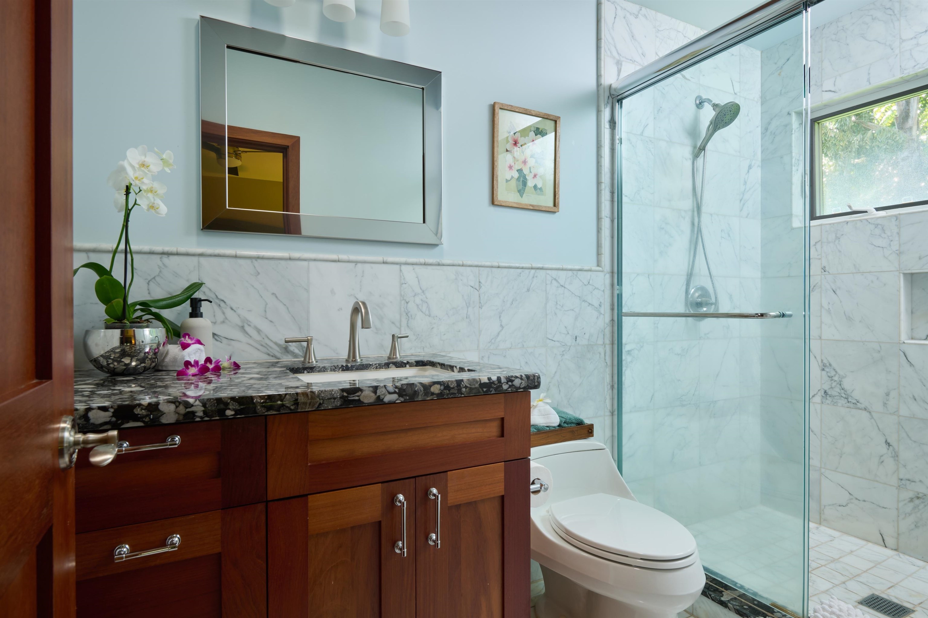 1642 West Kuiaha Road Haiku, HI 96708 - Photo 32 of 50 a bathroom with a granite countertop sink toilet and shower