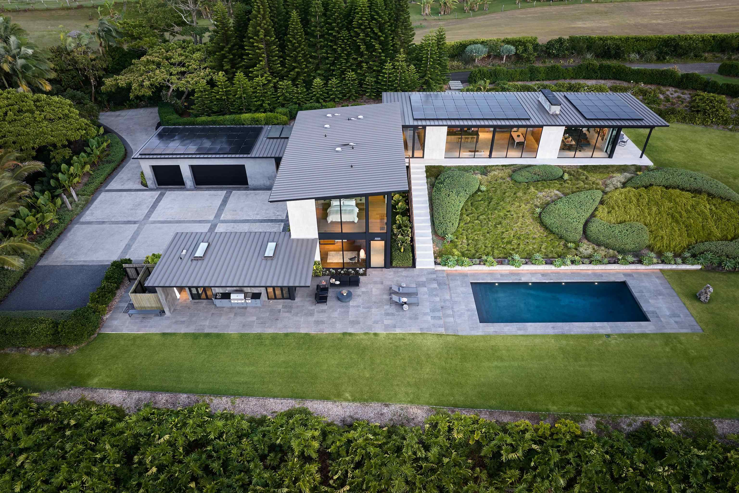1642 West Kuiaha Road Haiku, HI 96708 - Photo 43 of 50 an aerial view of a house with a garden and lake view