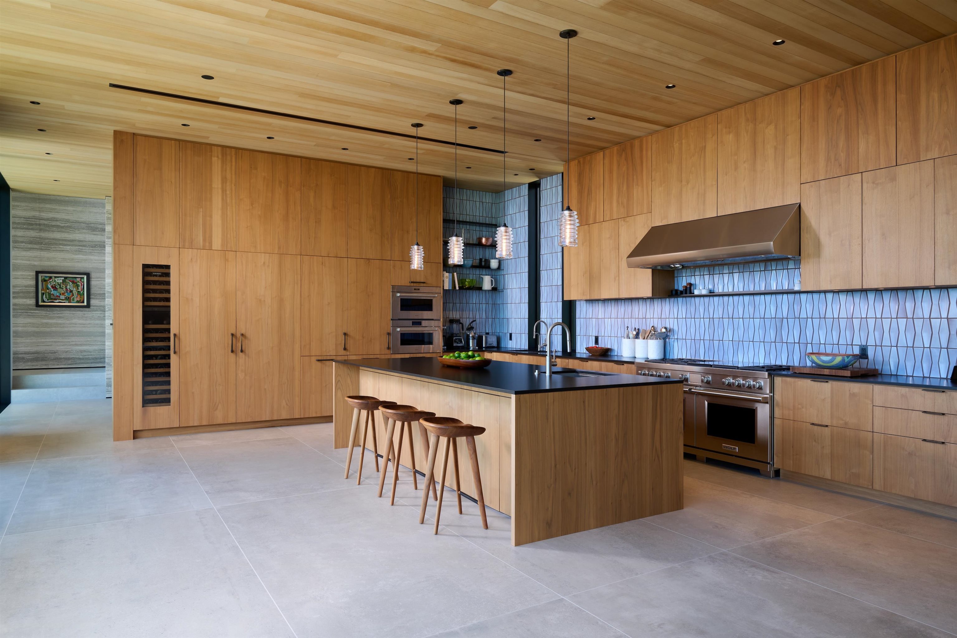 1642 West Kuiaha Road Haiku, HI 96708 - Photo 10 of 50 a kitchen with stainless steel appliances granite countertop a stove sink and cabinets