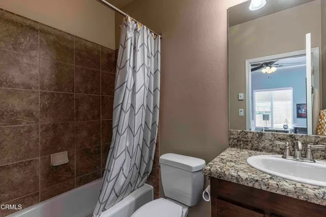 a kitchen with a stove top oven sink and cabinets