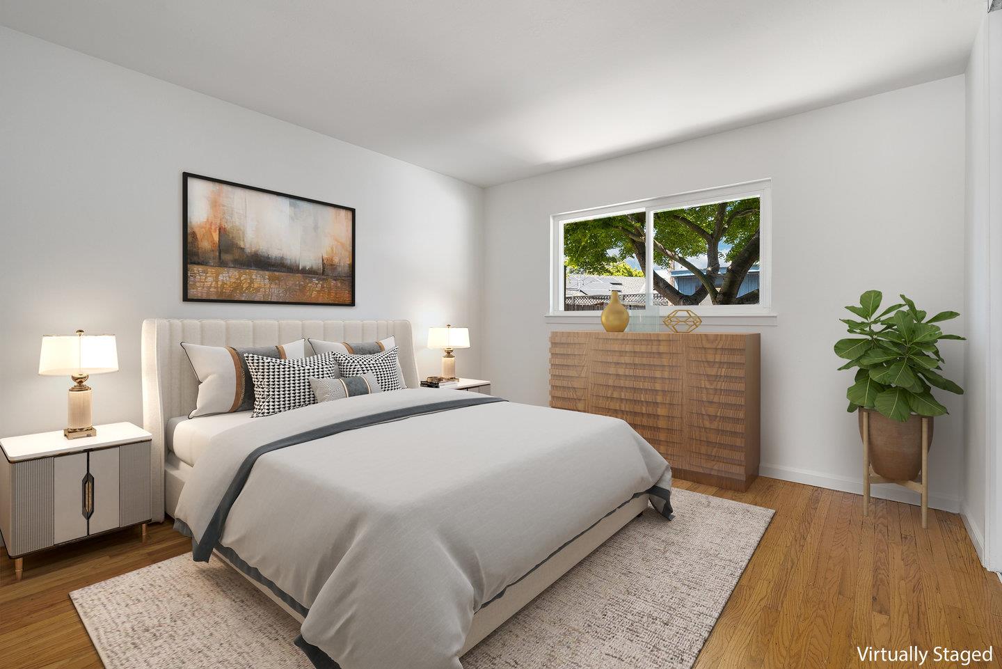 1107 Bismarck Drive Campbell, CA 95008 - Photo 12 of 21 a bedroom with a bed and a potted plant