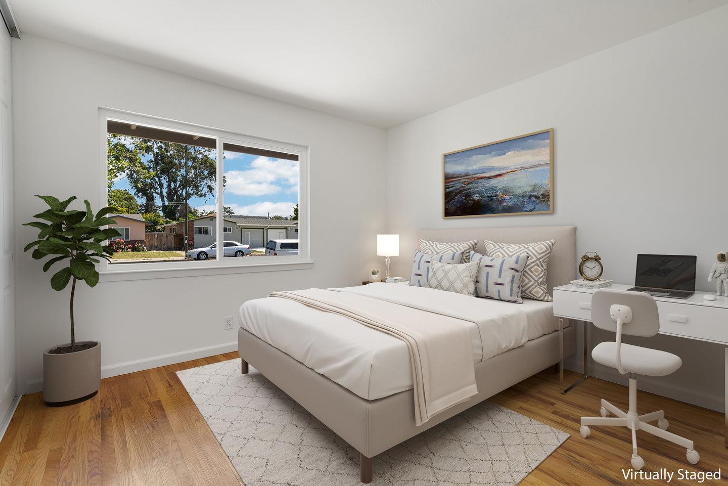 1107 Bismarck Drive Campbell, CA 95008 - Photo 13 of 21 a bedroom with bed and a potted plant
