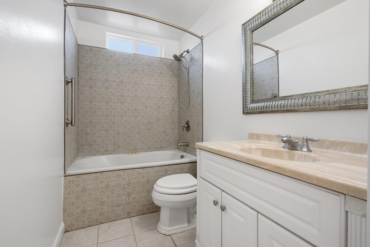 1107 Bismarck Drive Campbell, CA 95008 - Photo 15 of 21 a bathroom with a granite countertop sink toilet and shower