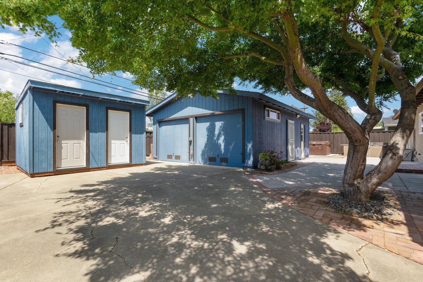 1107 Bismarck Drive Campbell, CA 95008 - Photo 19 of 21 a view of a house with a tree in front of it