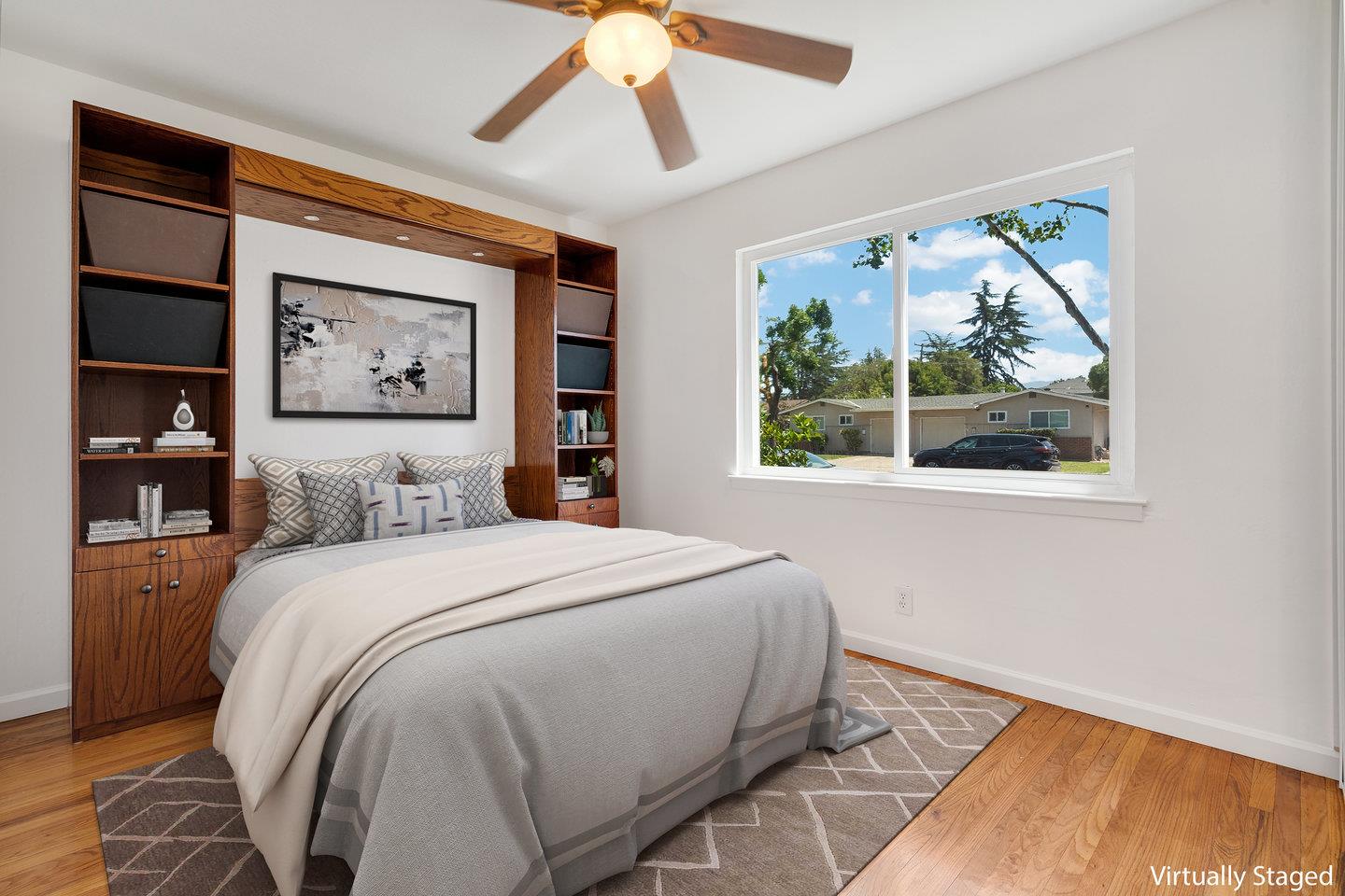 1107 Bismarck Drive Campbell, CA 95008 - Photo 9 of 21 a bedroom with a bed and a painting on the wall