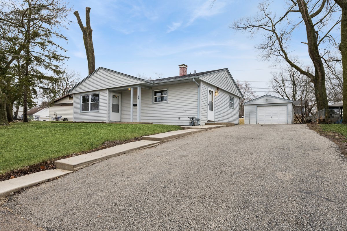 59 Wren Road Carpentersville, IL 60110 - Photo 1 of 19 a view of house with a yard
