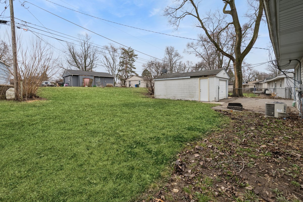 59 Wren Road Carpentersville, IL 60110 - Photo 3 of 19 a view of a house with a yard
