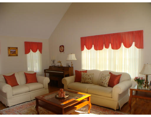 69 Arnold Road Sturbridge, MA 01518 - Photo 3 of 19 a living room with furniture and a couch