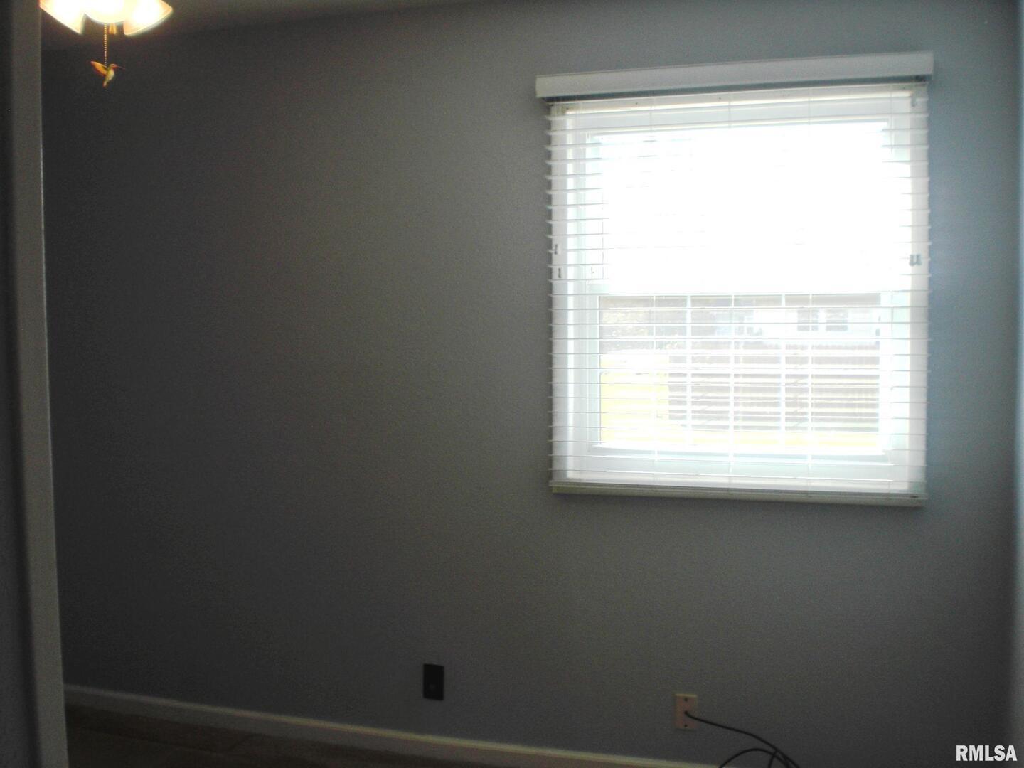 1109 Marion Street Carterville, IL 62918 - Photo 11 of 16 a bathroom with a window