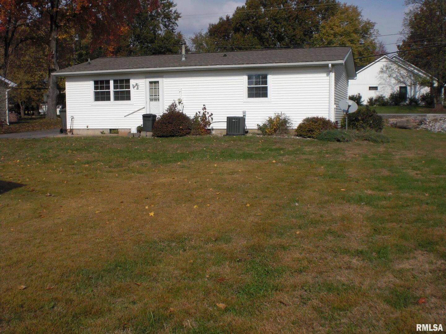 1109 Marion Street Carterville, IL 62918 - Photo 14 of 16 a house view with a backyard space