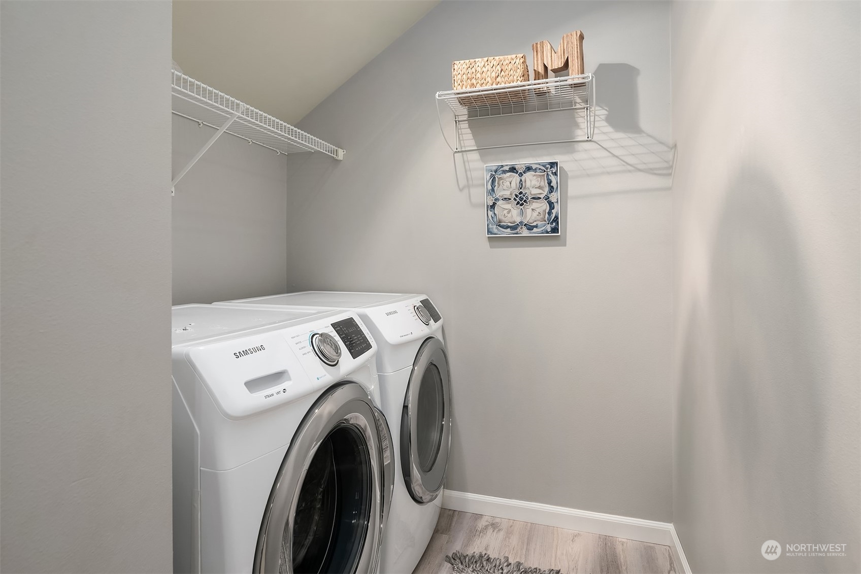 8517 Interlake Avenue North, Unit A Seattle, WA 98103 - Photo 17 of 20 a utility room with dryer and washer