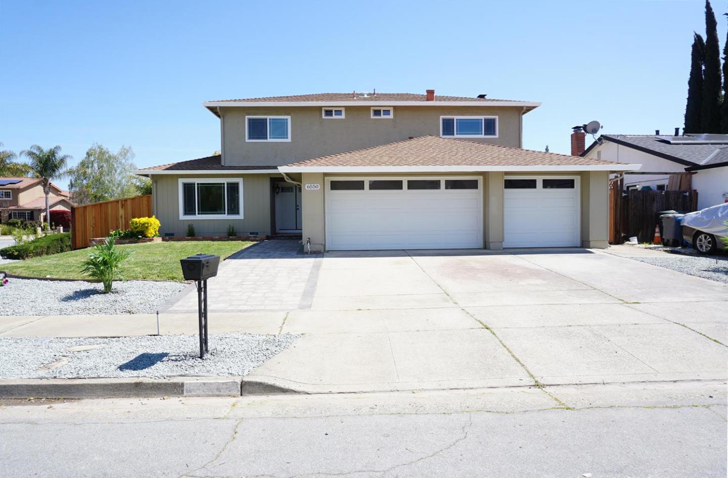 Kings Place Gilroy, CA 95020 - Photo 1 of 37 a front view of a house with yard and parking