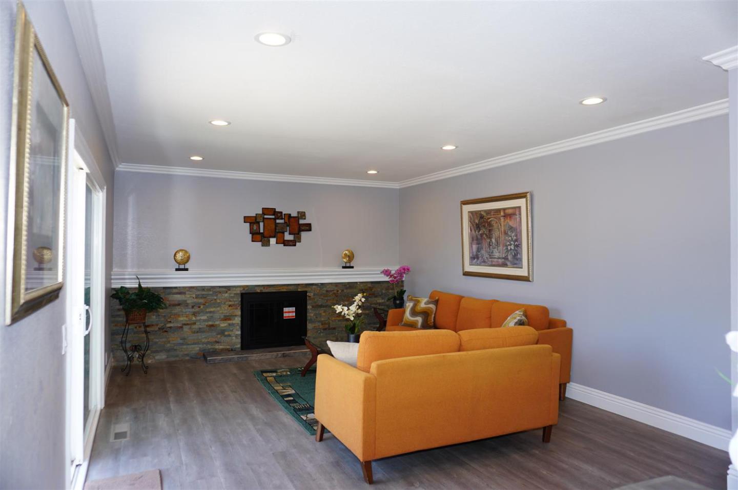Kings Place Gilroy, CA 95020 - Photo 12 of 37 a living room with furniture and a fireplace
