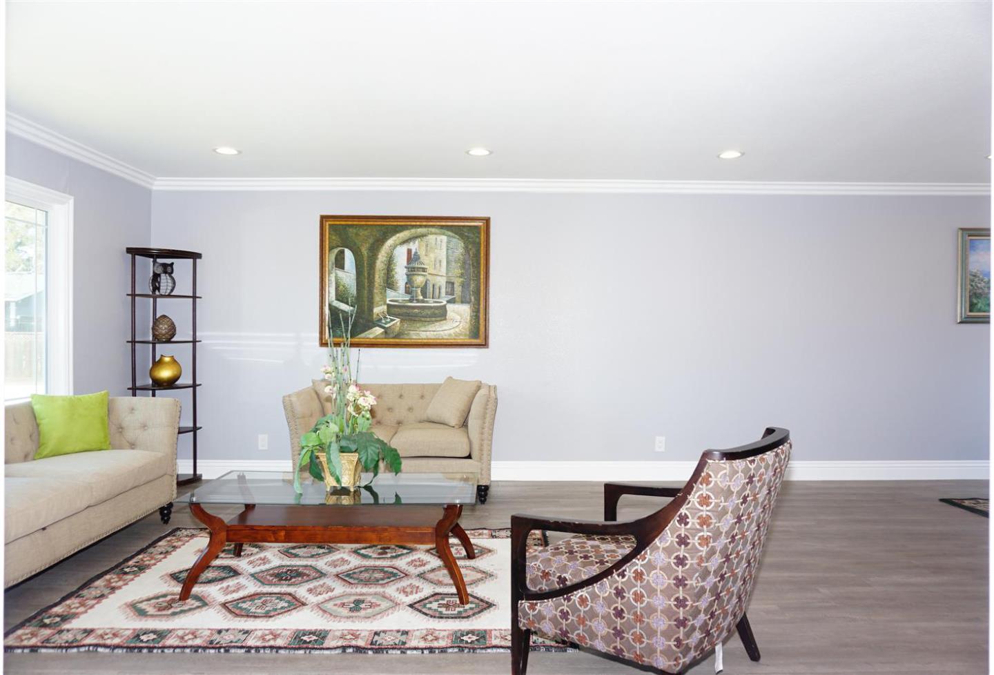 Kings Place Gilroy, CA 95020 - Photo 13 of 37 a living room with furniture and wooden floor