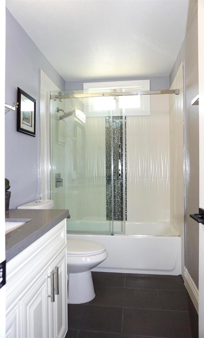 Kings Place Gilroy, CA 95020 - Photo 15 of 37 a bathroom with a sink a toilet and shower