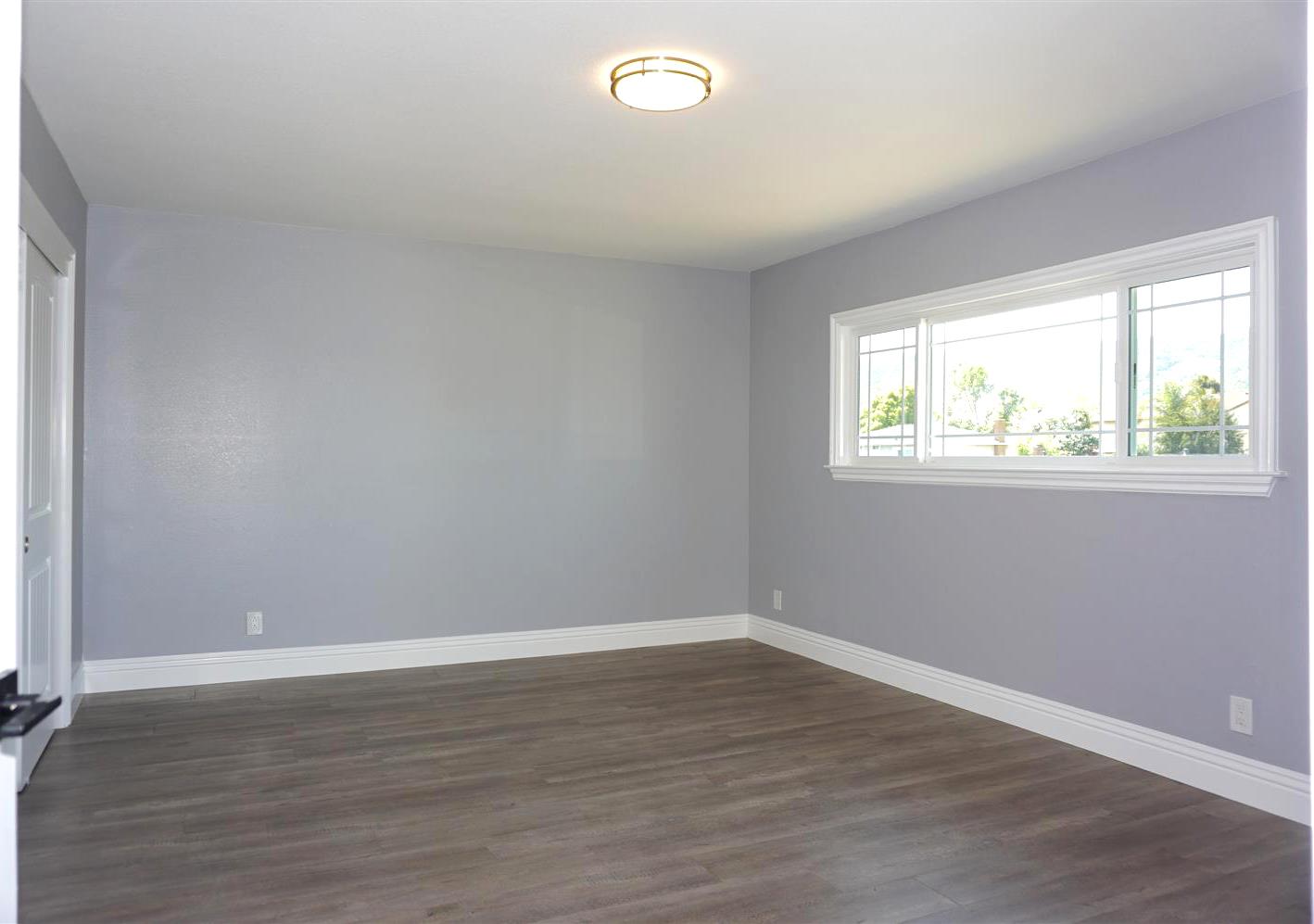 Kings Place Gilroy, CA 95020 - Photo 29 of 37 a view of a room with wooden floor and windows