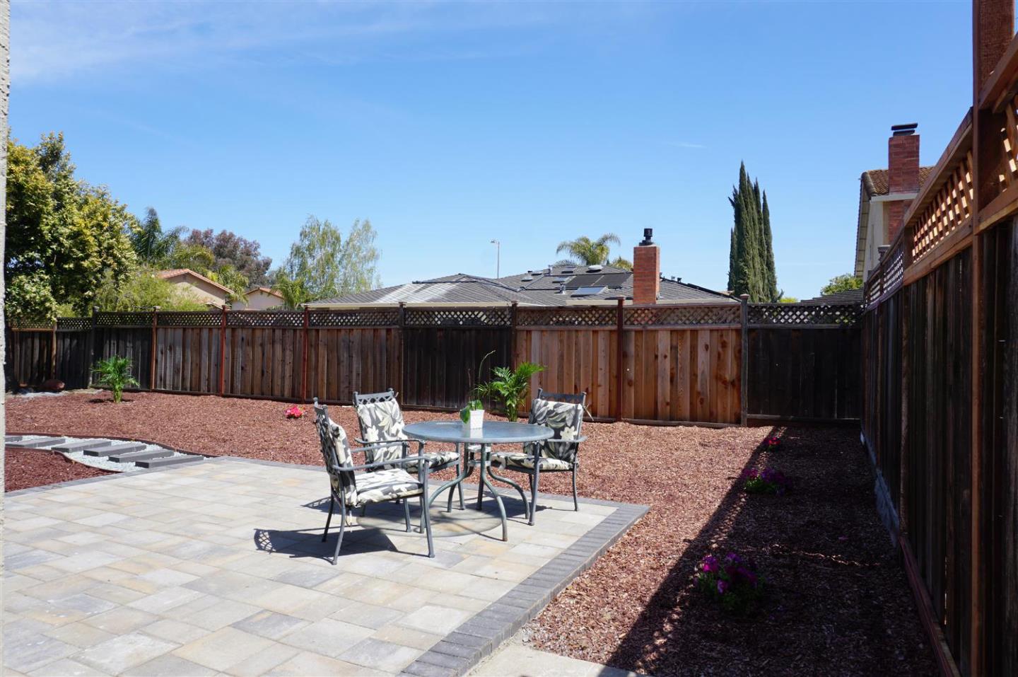 Kings Place Gilroy, CA 95020 - Photo 34 of 37 a view of a patio with a table and chairs