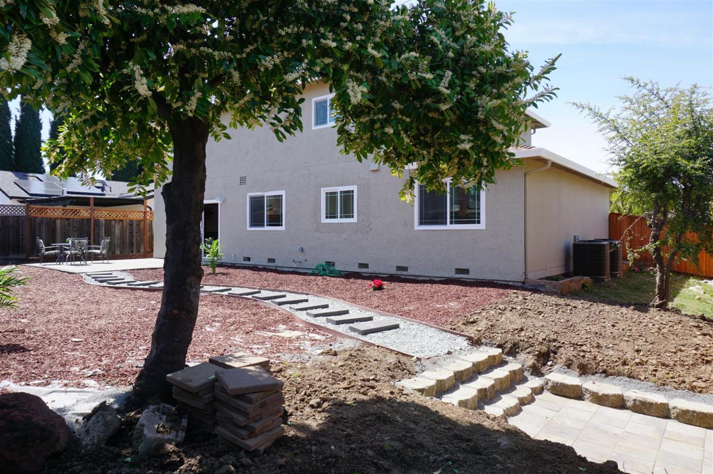 Kings Place Gilroy, CA 95020 - Photo 35 of 37 a house with trees in the background