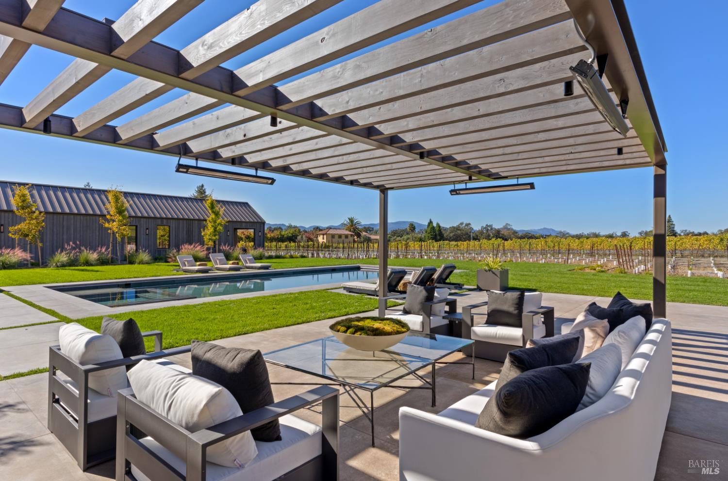 1590 McKinley Road Napa, CA 94558 - Photo 5 of 68 a view of a patio with swimming pool