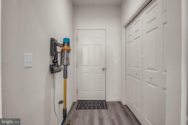 a view of a bedroom from a hallway