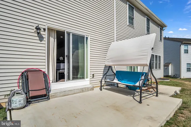 a view of a lounge chairs in the patio