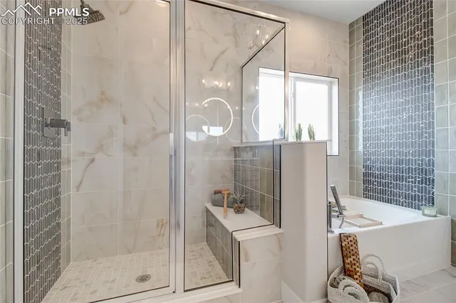 a bathroom with a shower and bathtub