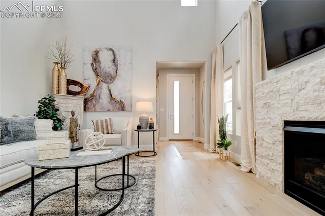 a view of a livingroom with furniture and wooden floor
