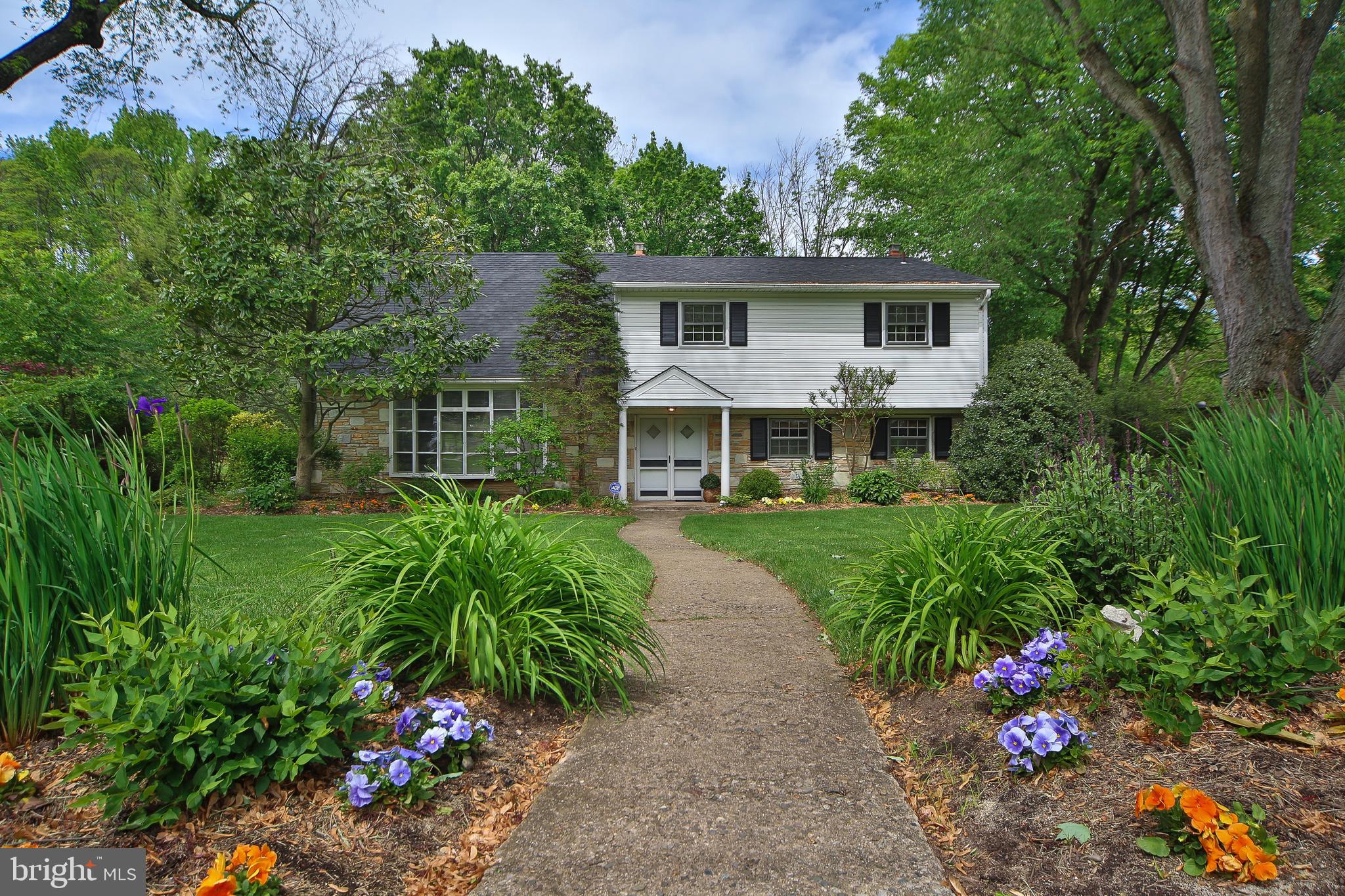 459 Wingate Road Huntingdon Valley, PA 19006 - Photo 2 of 31 a front view of a house with a yard and fountain