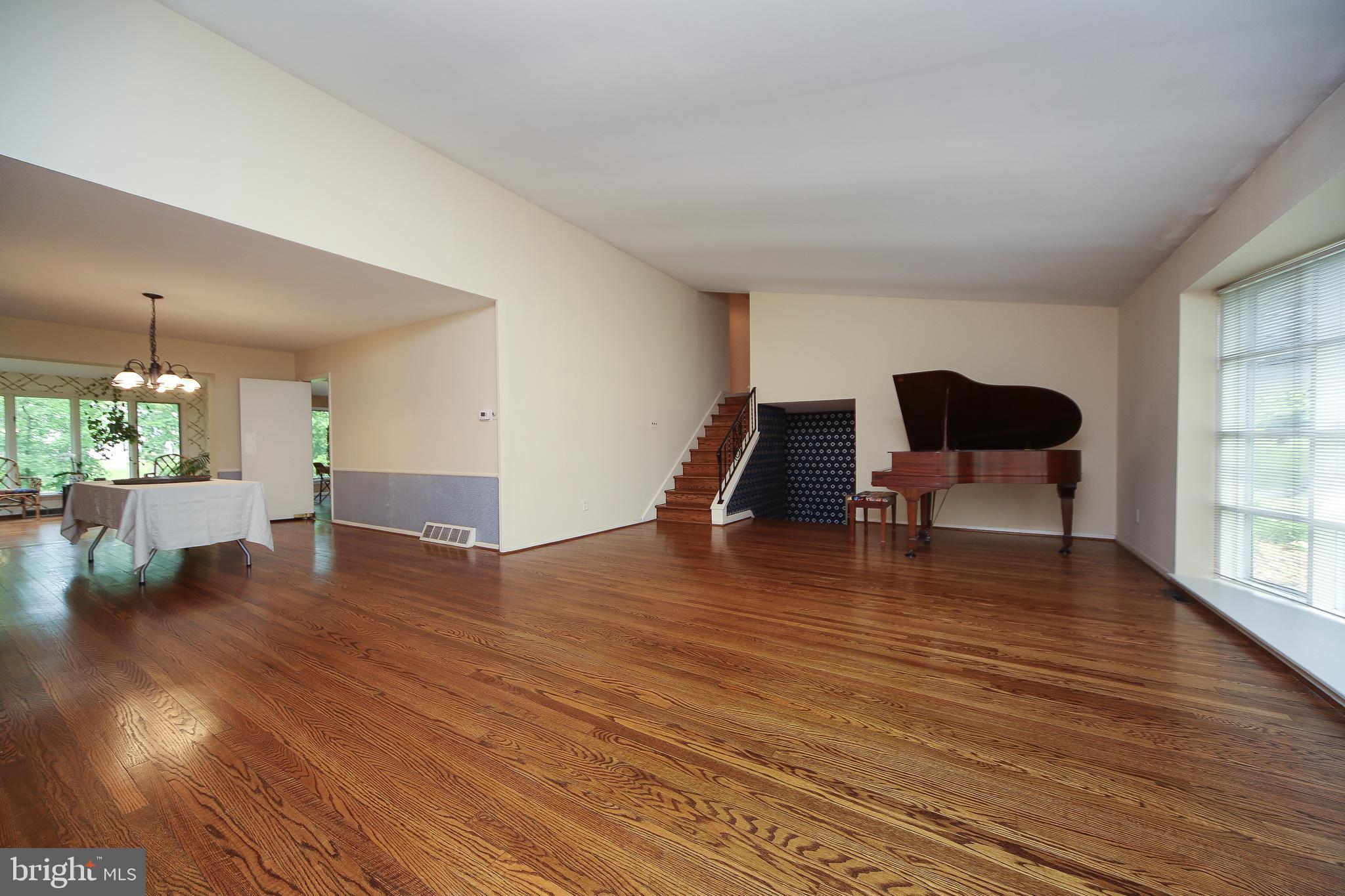 459 Wingate Road Huntingdon Valley, PA 19006 - Photo 11 of 31 a living room with furniture and a wooden floor