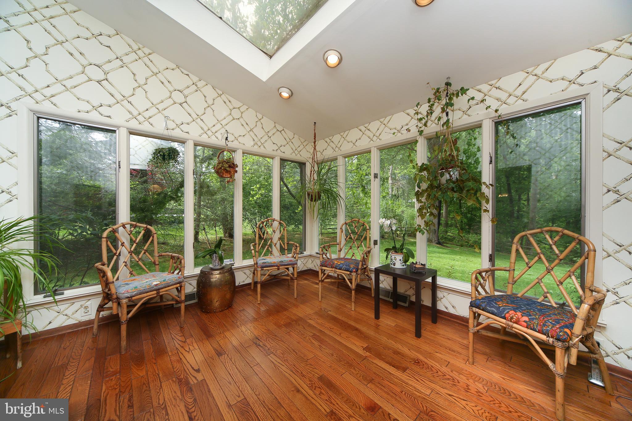 459 Wingate Road Huntingdon Valley, PA 19006 - Photo 14 of 31 a living room with furniture and floor to ceiling windows