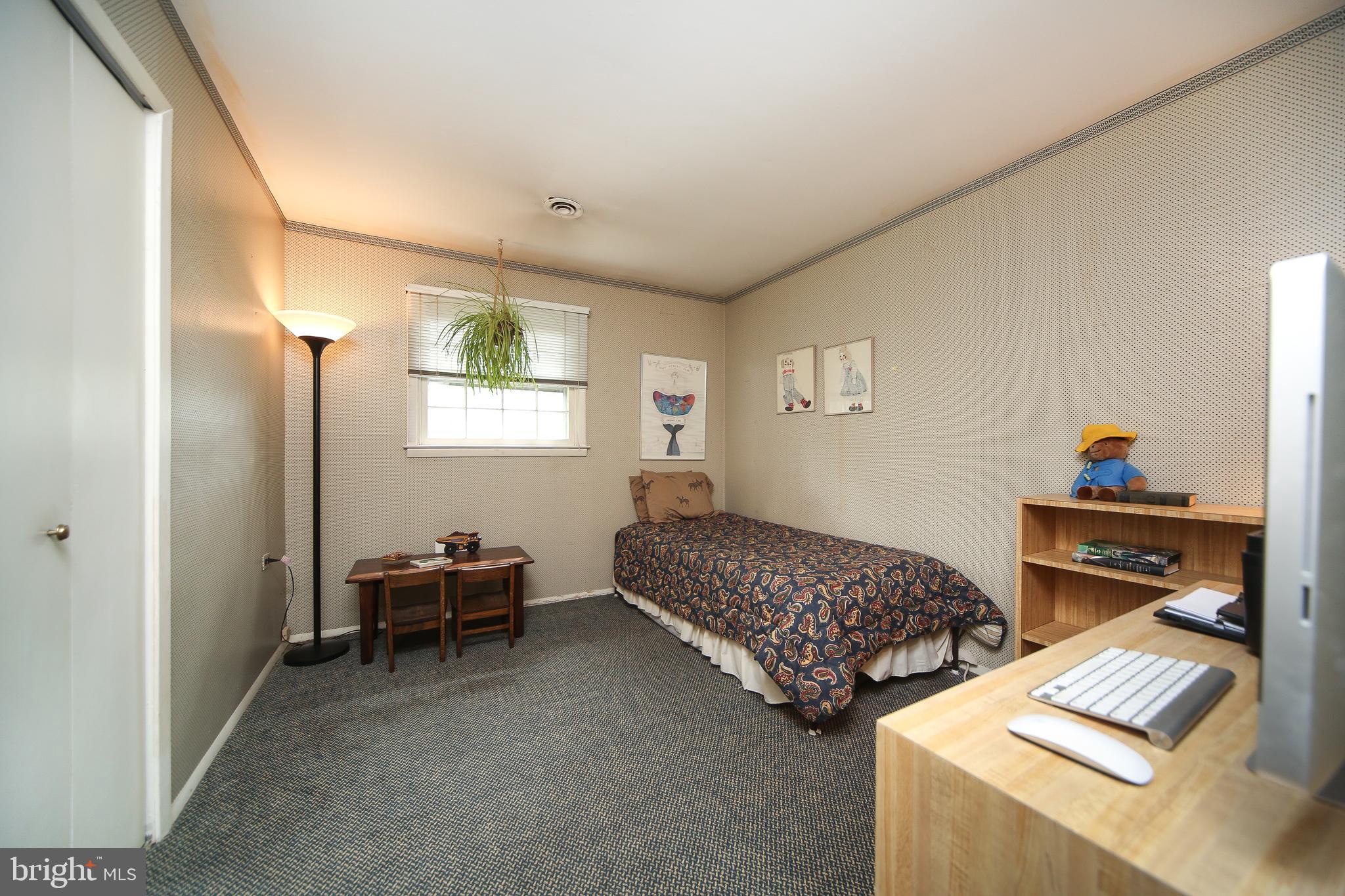 459 Wingate Road Huntingdon Valley, PA 19006 - Photo 19 of 31 a bedroom with furniture and a window