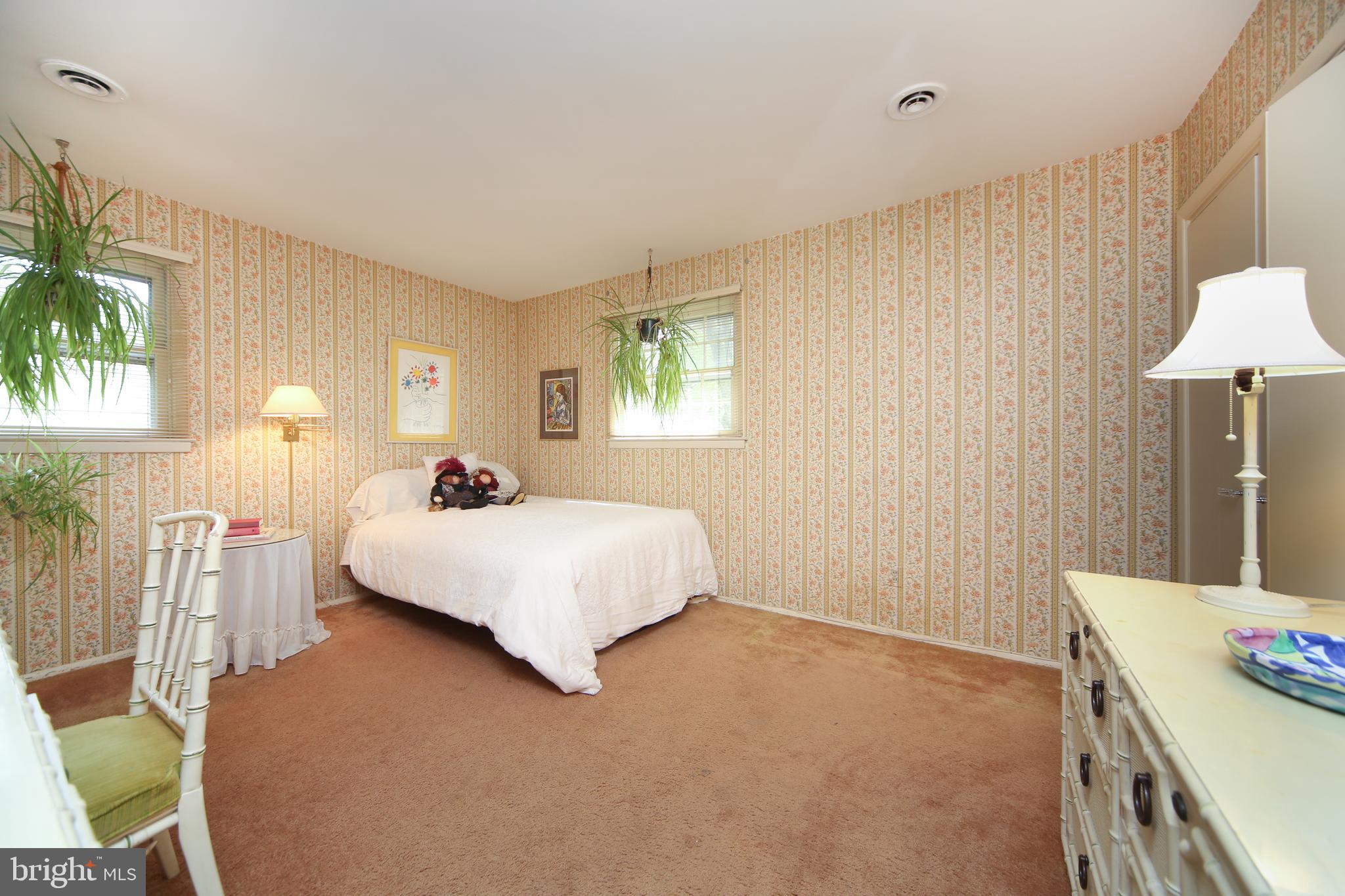 459 Wingate Road Huntingdon Valley, PA 19006 - Photo 21 of 31 a bed room with a bed window and a table