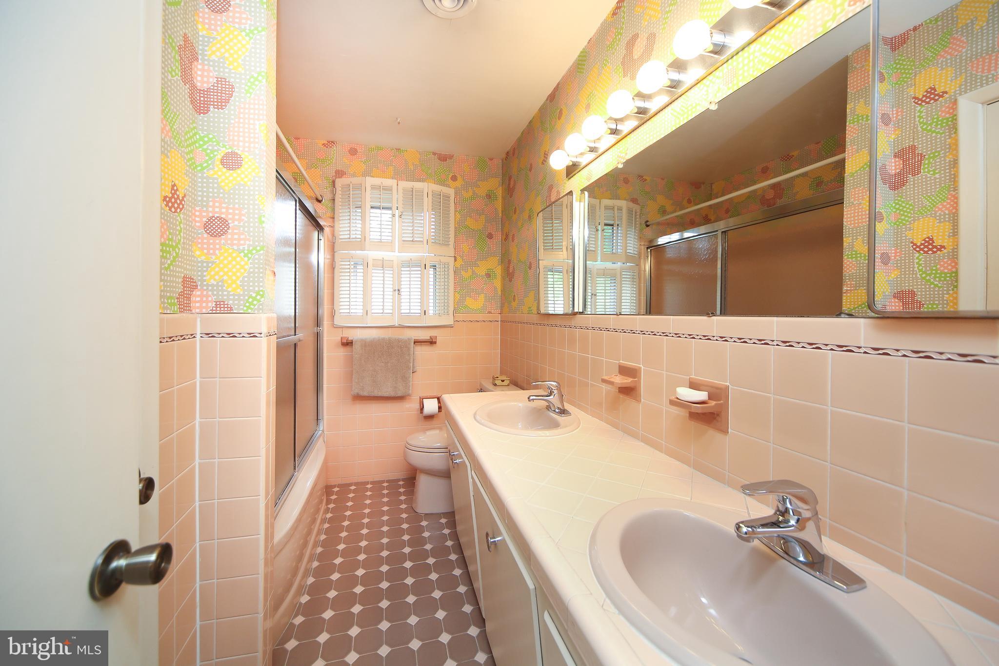 459 Wingate Road Huntingdon Valley, PA 19006 - Photo 22 of 31 a bathroom with a sink and a mirror