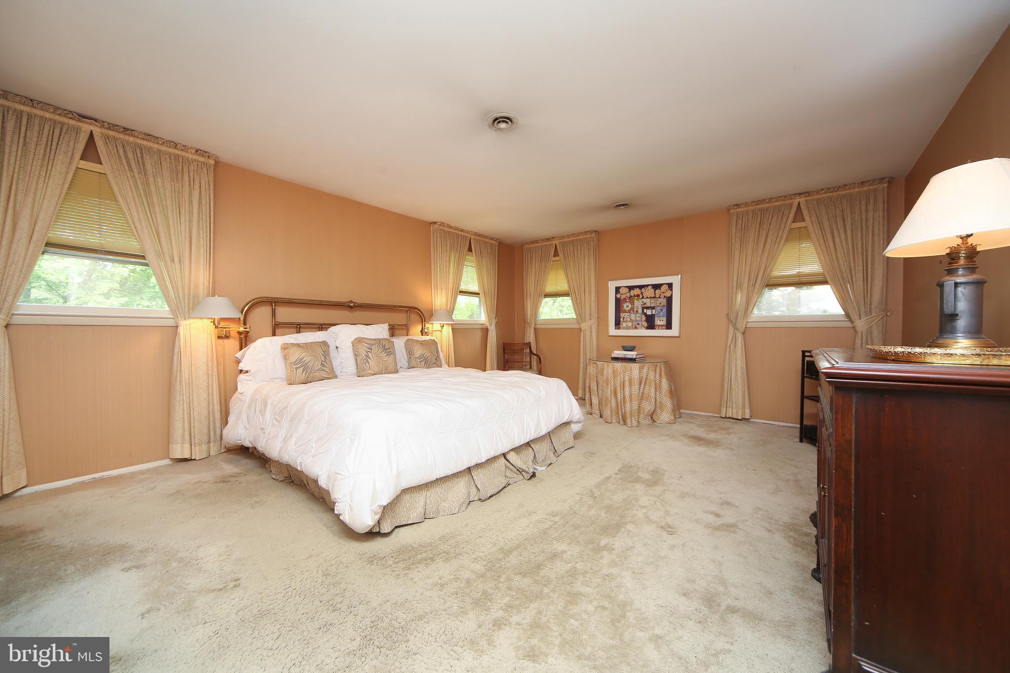 459 Wingate Road Huntingdon Valley, PA 19006 - Photo 23 of 31 a bedroom with a bed and a window