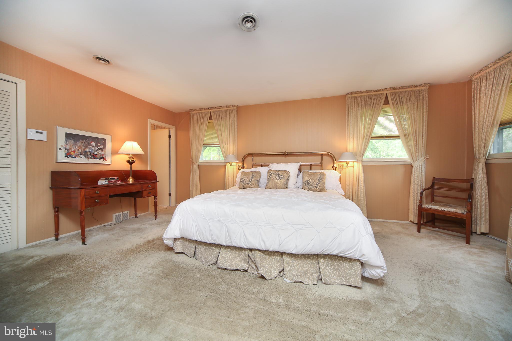 459 Wingate Road Huntingdon Valley, PA 19006 - Photo 24 of 31 a bedroom with a bed and a window